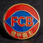拜仁慕尼黑俱乐部徽章，蓝色菱形图案中红色字母FCB，德甲霸主标志